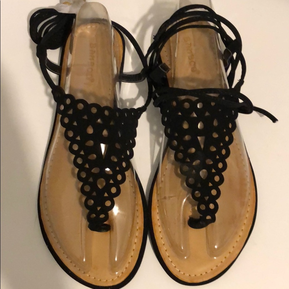 Size 7 1/2 brand new black tie up sandals